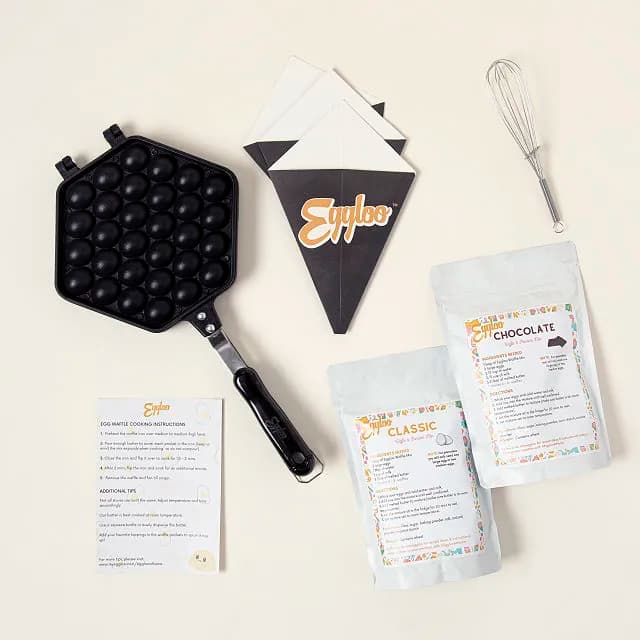 Eggloo at Home kit with egg waffle pan, mixes, and recipe cards